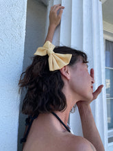 Load image into Gallery viewer, 1980s Deadstock Buttercup Yellow Oversized Silver Hair Bow