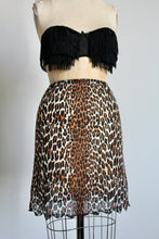 Load image into Gallery viewer, 1960s Nylon Leopard Print Slip Skirt w/ Jagged Hemline